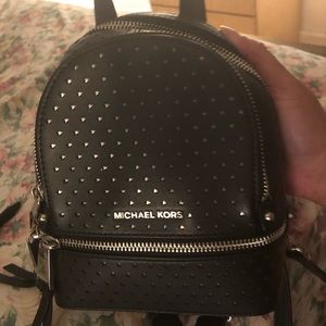 Rhea mini perforated leather backpack